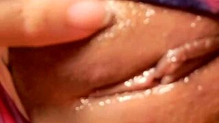 Hey watch this naughty girl shake her ass while rubbing her pussy hard