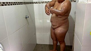 amazing hidden cam catches neighbor bathing and fingering her wet shaved pussy👀💦