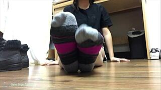 asian cougar peels puma socks showing wrinkled sexy soles
