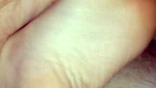 she gives him a homemade barefoot footjob ending in huge cumshot