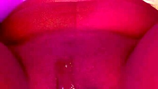 Ebony beauty's pussy throbs as she masturbates to intense squirting orgasm peaks.