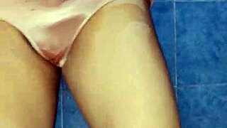 hey, wanna peek at this lingerie model's panty tease with dildo dance?