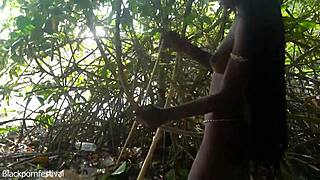 Skinny Naked Tribe Woman Crafts Hunting Bow