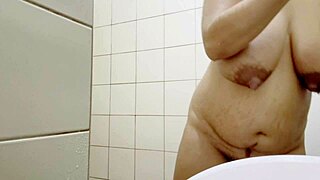 Indian Step Mom's Big Boobs and Hairy Pussy Shine in Shower