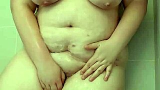 Brunette BBW Big Tits Teases Her Fat Ass and Natural Boobs in Homemade Shower Bath