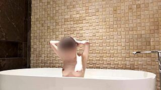 Skinny japanese brunette amateur bathes feet legs small tits luxury hotel shower
