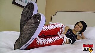 Petite bailey paige wraps sweaty feet around phillyjhon for footjob. She grinds toes on his shaft till he bursts.