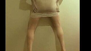 crossdresser maria struts in see-through white nylon panties high heels leggings and miniskirt for foot fetish tease