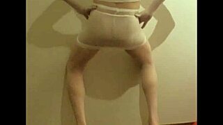 crossdresser maria struts in see-through white nylon panties high heels leggings and miniskirt for foot fetish tease