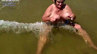 granny's huge saggy beach tits bounce in see-through top closeup