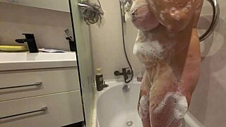 Watch her soapy shaved stepsister pussy glisten in 4k slow motion tease