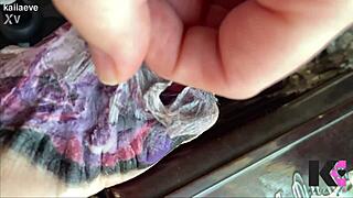 Fresh tattoo glistens on babe's skin in slow motion peel