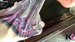 Fresh tattoo glistens on babe's skin in slow motion peel