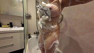 Watch her soapy shaved stepsister pussy glisten in 4k slow motion tease