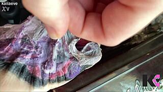 Fresh tattoo glistens on babe's skin in slow motion peel