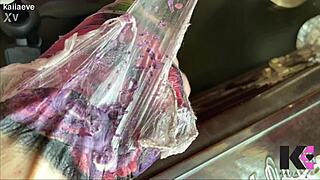 Fresh tattoo glistens on babe's skin in slow motion peel