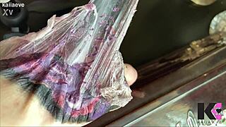 Fresh tattoo glistens on babe's skin in slow motion peel