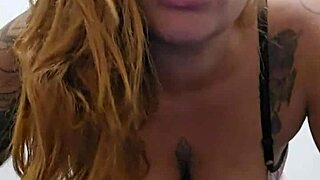 Hot redhead flashes pink pussy and perky tits in solo tease outdoors