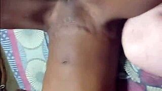 this black girl gets sensual touches from a white man, showing off her juicy ebony pussy and tight petite body up close