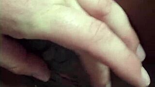 this black girl gets sensual touches from a white man, showing off her juicy ebony pussy and tight petite body up close