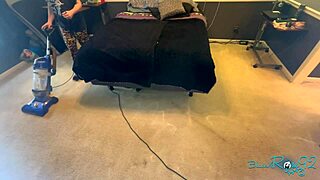 brunette milf housewife vacuums bedroom in tight natural tits outfit