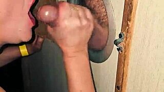 she sucks huge cock at glory hole till he cums in mouth