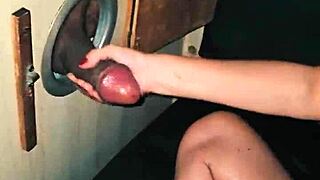 she sucks huge cock at glory hole till he cums in mouth