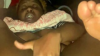 Ebony babe fingers her creamy pussy with saggy tits bouncing