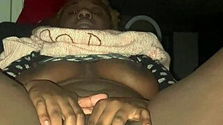 Ebony babe fingers her creamy pussy with saggy tits bouncing