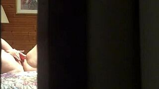 Peeping tom spies amateur milf fingering pussy at hotel