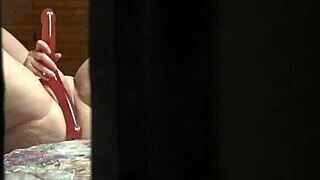 Peeping tom spies amateur milf fingering pussy at hotel