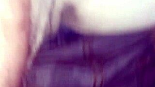 Woman wets pants with cloth diaper then enjoys two nighttime orgasms on rainy evening