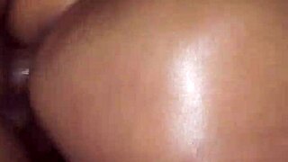 This juicy ebony milf gets her big oiled ass bent over and fucked doggystyle by daddy's monster cock