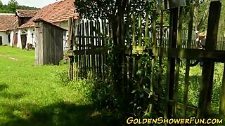 Outdoor redhead drenched in piss then blasted with group cumshot