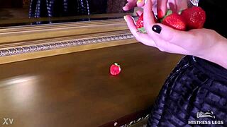 Juicy strawberry crushed closeup under cute wrinkled bare feet toes goddess!