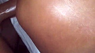 This juicy ebony milf gets her big oiled ass bent over and fucked doggystyle by daddy's monster cock