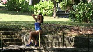 Sapphira A undresses petite body outdoors in blue for tempting tease