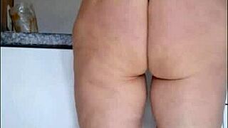 hidden cam catches sexy milf stepmom in see thru blouse kitchen flashing