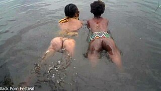 Tribal Lesbians Bathe Together In Village River Sparks Heat!
