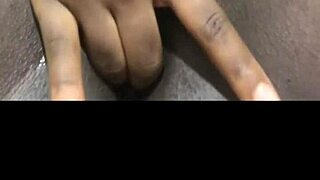 Black babe fingers huge wet pussy solo