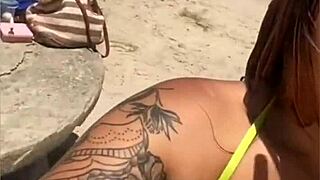 hey look at this married woman flashing her stuff on the beach to grab all the attention!!