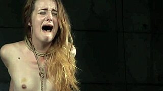 feel the sting as bdsm sub's g-string whips echo in tied-up torment