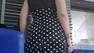 mimi flashes her bare pussy at the laundromat.