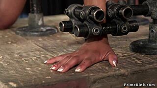 Slim ebony bound tight, device holds her for deep throat choke