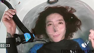 Skinny spandex slow underwater bathtub dive