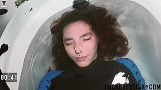 Skinny spandex slow underwater bathtub dive