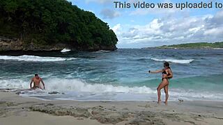 hot brunette stranger deepthroats cock on beach swallows cum