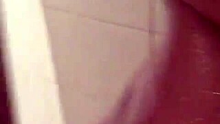 check out this 19 year old cutie teasing her boobs in the shower