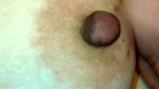 Japanese bbw milf pinches and tugs her fat nipples during teasing tit play session