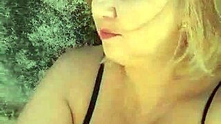 This mature blonde hits the beach flashing her huge natural tits and big pussy lips for fetish fun.